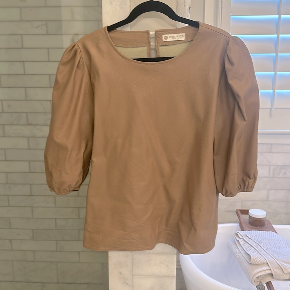 Faux leather caramel puff sleeve top. Beautiful material and color